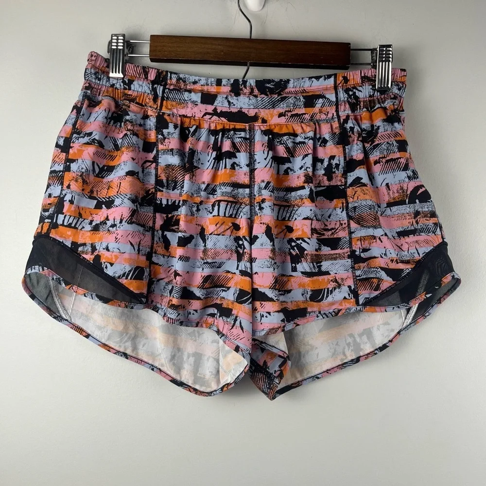 Lululemon Hotty Hot Multi Shorts size 10 tall Black Blue Orange print
